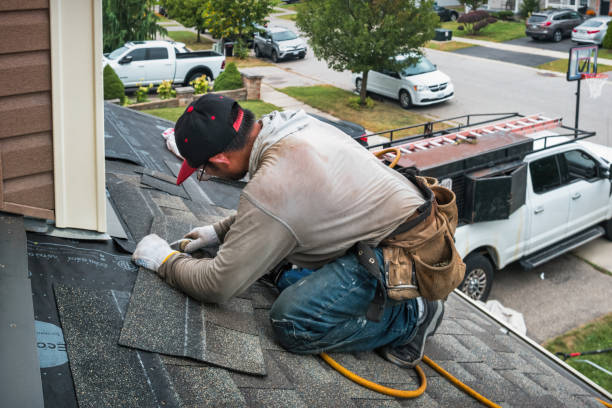 Professional Roofing technician working in Forest, OH